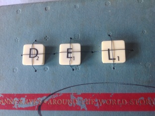 Book cover, scrabble chips